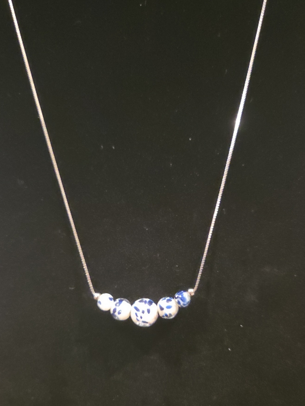 NOGU STARLIT WAVES STERLING SILVER AND FIREFLY GLASS BEAD NECKLACE